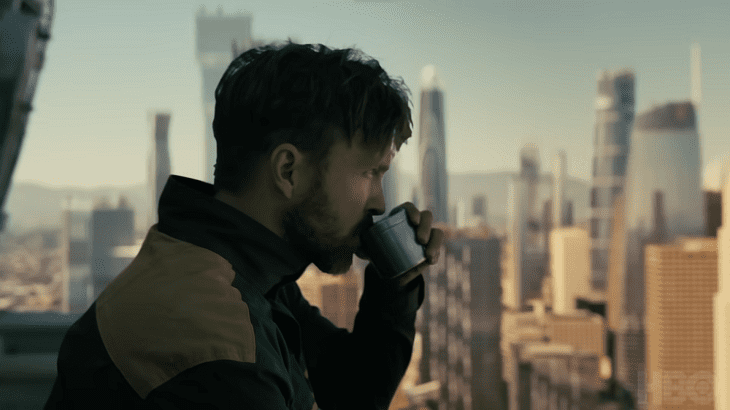 Caleb sips coffee on skyrise