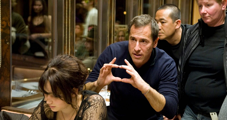 David O' Russell on the set of Silver Linings Playbook with Jennifer Lawrence. Via Weinstein Company/Courtesy Everett Coll/Everett Collection