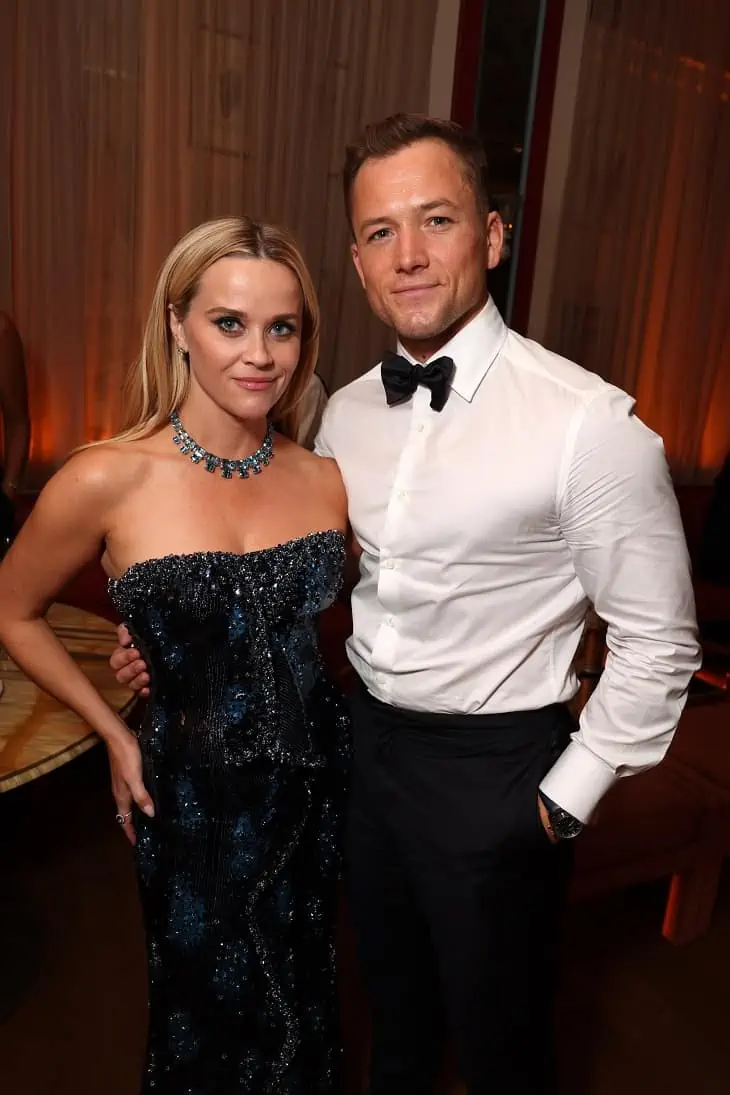 Reese Witherspoon and Taron Egerton attend the Apple TV+ Primetime Emmy Reception Red Carpet at Mother Wolf.