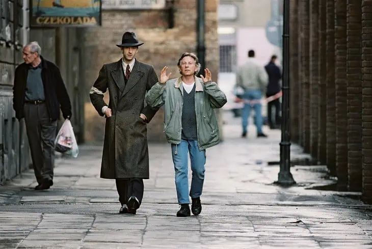 Roman Polanski directing Adrien Brody in The Pianist (2002)