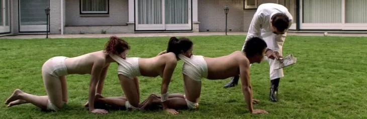 Dieter Laser, Akihiro Kitamura, Winter Williams, and Ashlynn Yennie in The Human Centipede (First Sequence) (2009)