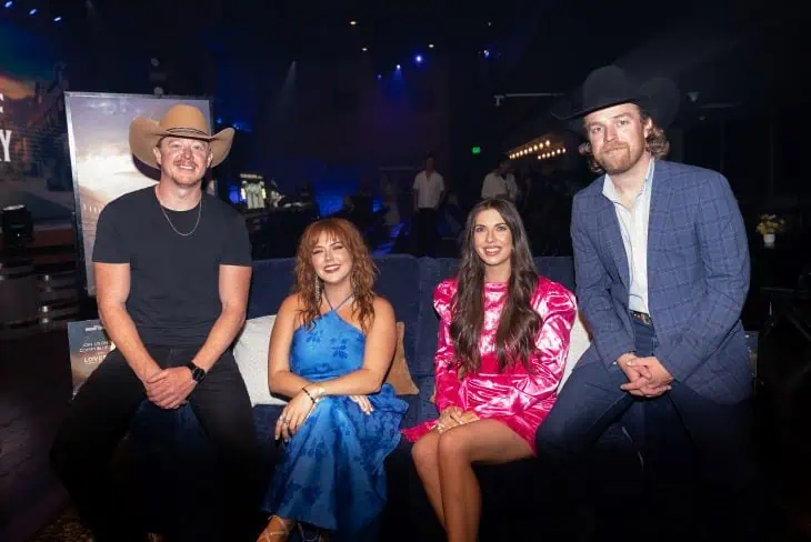 Adam Sanders, Cassidy Daniels, Jenny Tolman, and Jon Wood on the red carpet