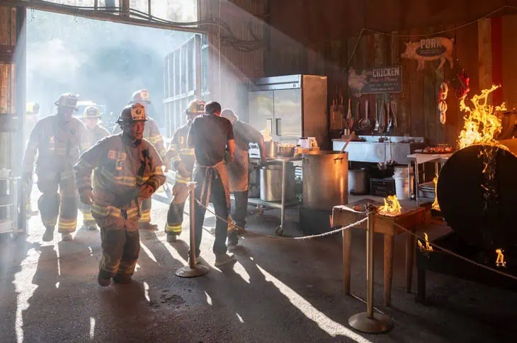 Fire Country S4E6: Company officer deploys extinguisher on burning prep table