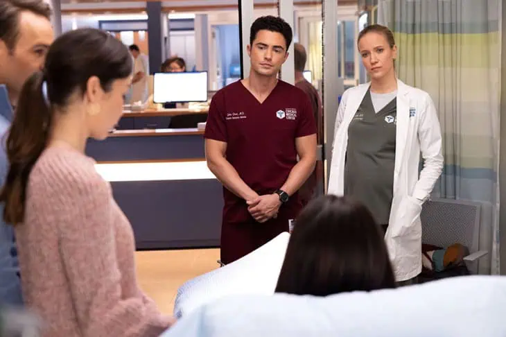 CHICAGO MED -- "Spill Your Guts" Episode 1112 -- Pictured: (l-r) Darren Barnet as Dr. John Frost, Jessy Schram as Dr. Hannah Asher -- (Photo by: George Burns Jr/NBC)